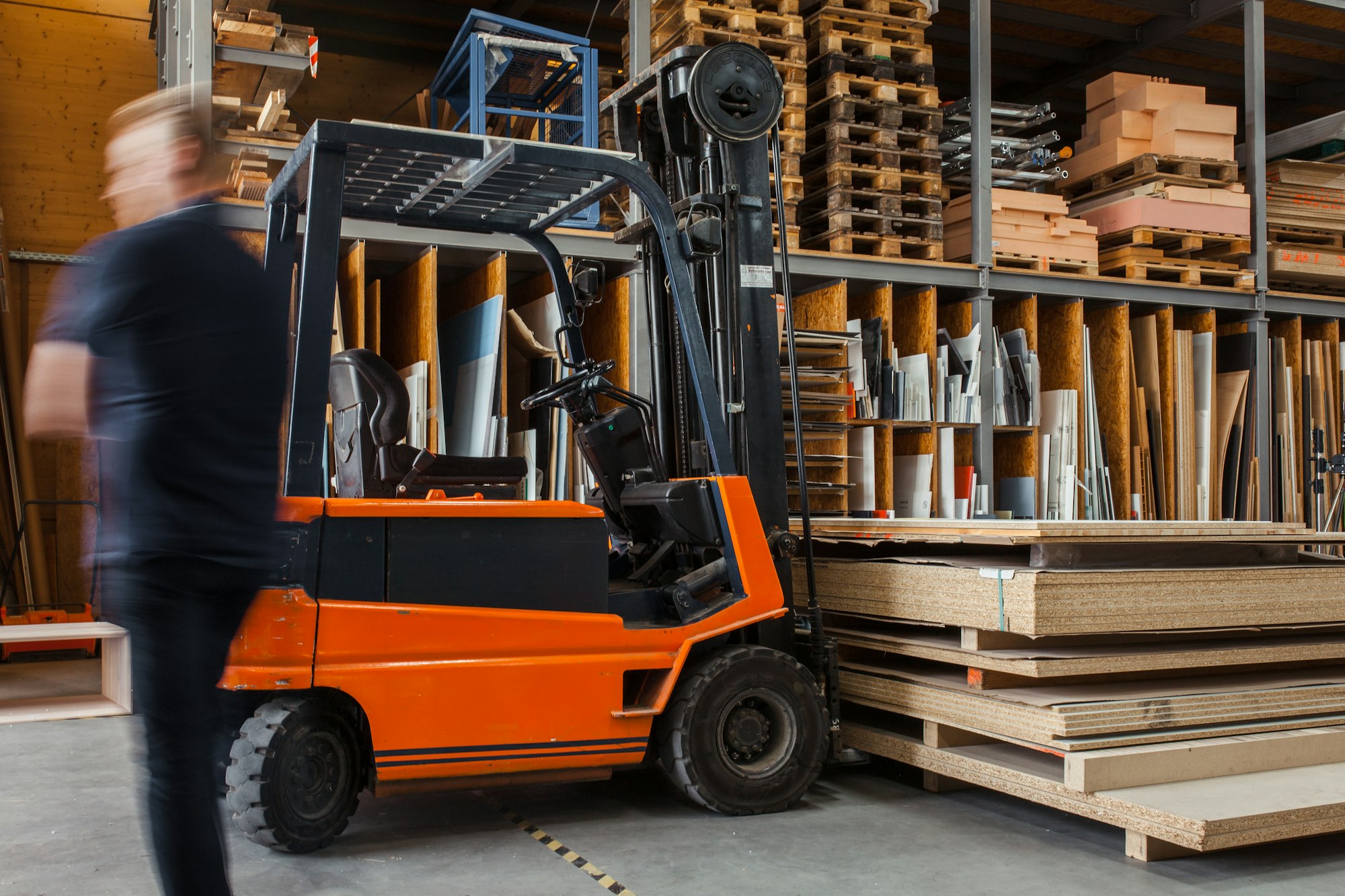 Workers loading cartons into a shipping container